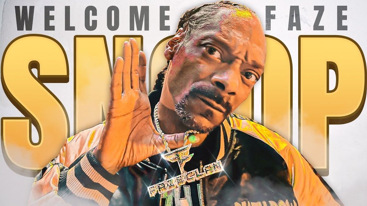 Snoop Dogg holds up a FaZe Clan necklace while posing in front of a sign reading &quot;Welcome FaZe Snoop&quot;.