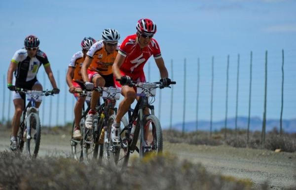 Christoph Sauser sets the pace for the four leaders.