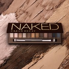Urban decay naked palette overlaid on background of neutral paint swatches 