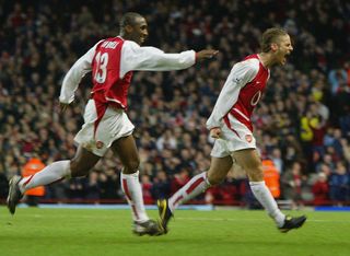 LONDON - JANUARY 24: David Bentley of Arsenal celebrates scoring their fourth goal during the FA Cup Fourth round match between Arsenal and Middlesbrough at Highbury on January 24, 2004 in London. (Photo by Clive Rose/Getty Images)