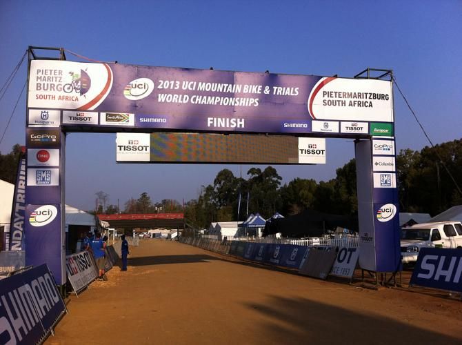 The cross country racers will finish under this 2013 MTB Worlds banner.