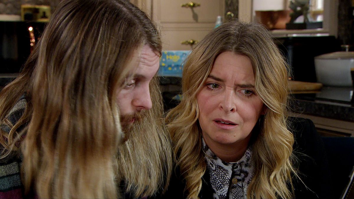 Charity is shocked as she and Ryan look through a laptop she&#039;s stolen from Home Farm