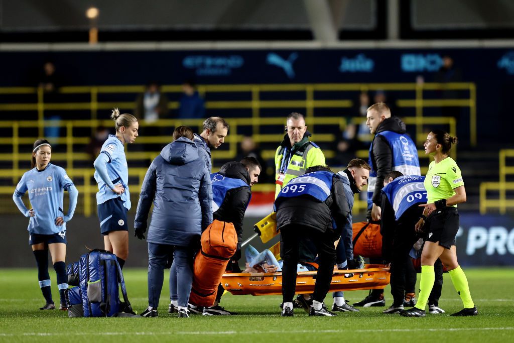 Alex Greenwood of Manchester City is stretchered off after an injury during the UEFA Women&#039;s Champions League match between Manchester City and SKN St. Pölten at Manchester City Academy Stadium on December 12, 2024 in Manchester, England.