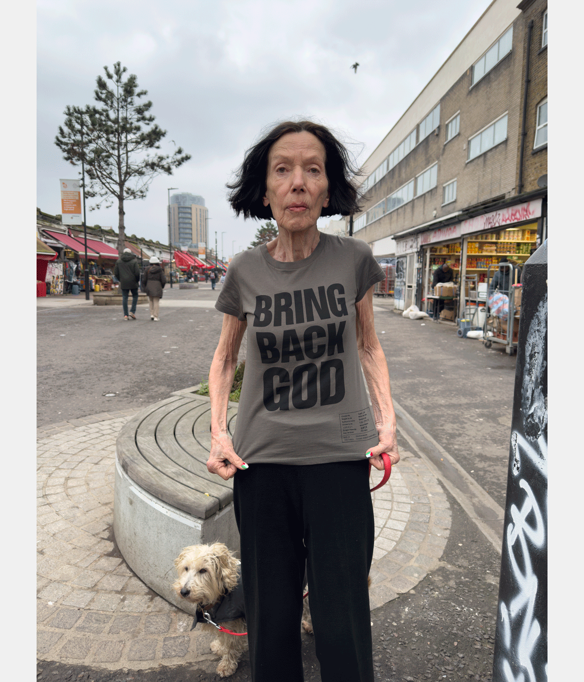 Juergen Teller photograph f woman wearing T-shirt saying &#039;bring back god&#039;