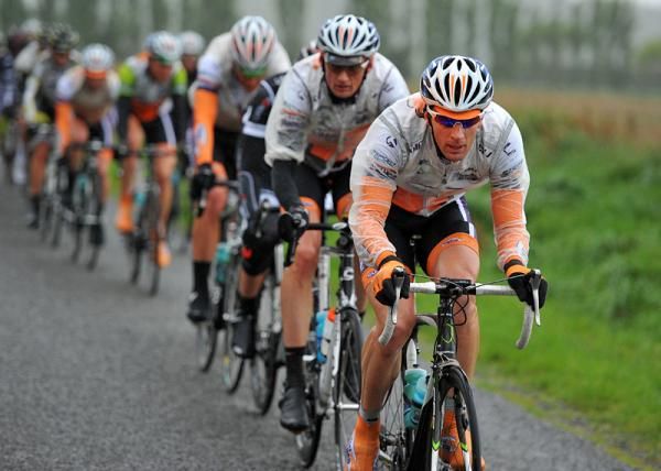 Justin Kerr (Share the Road) leads the peloton