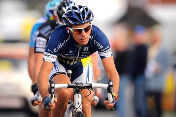 Marco Marcato (Vacansoleil) leads Jakob Fuglsang (Saxo Bank) in the break of the day.