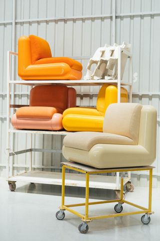 colourful modular chairs by Holloway Li on scaffolding