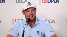 Bryson DeChambeau talks to the media before the US Open