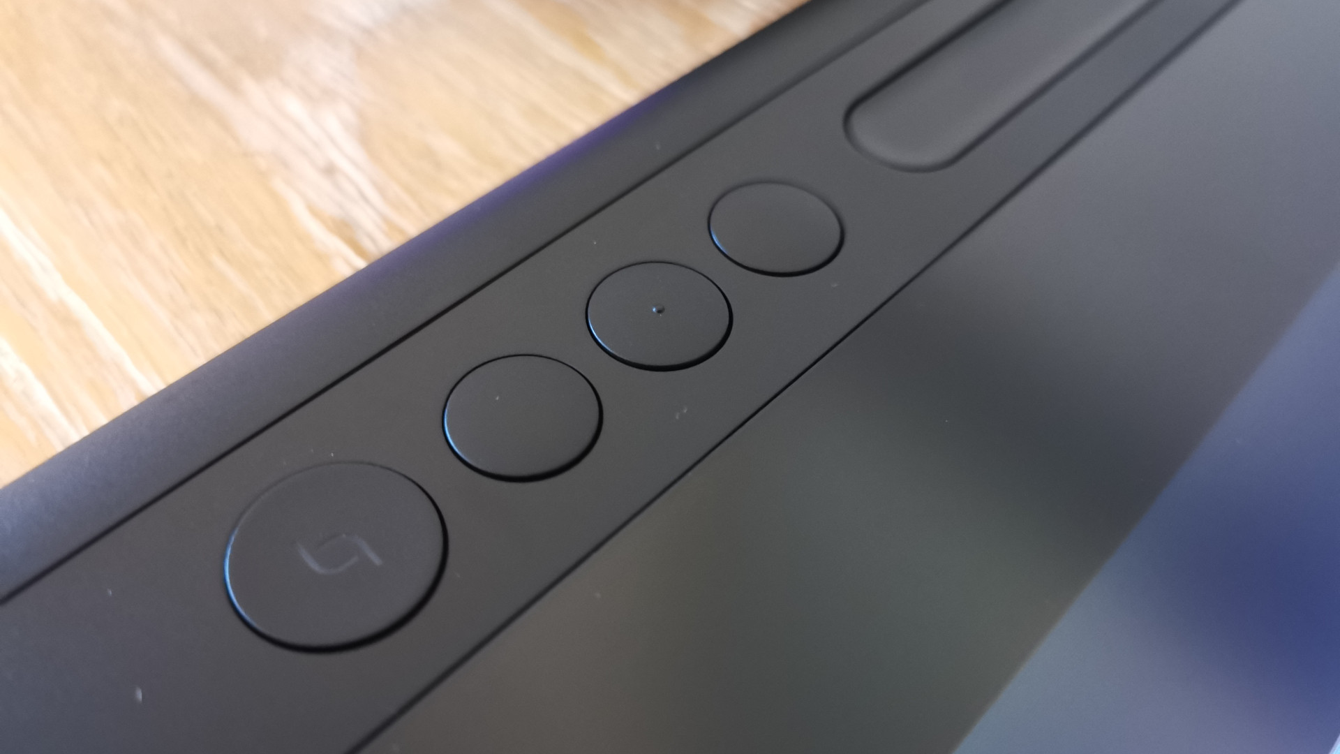 The lower buttons on the Huion Kamvas Pro 16