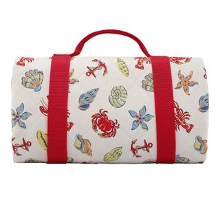 Sea creature themed picnic blanket with red straps