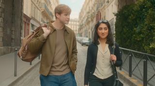 Dexter and Emma walk through the streets of Paris.