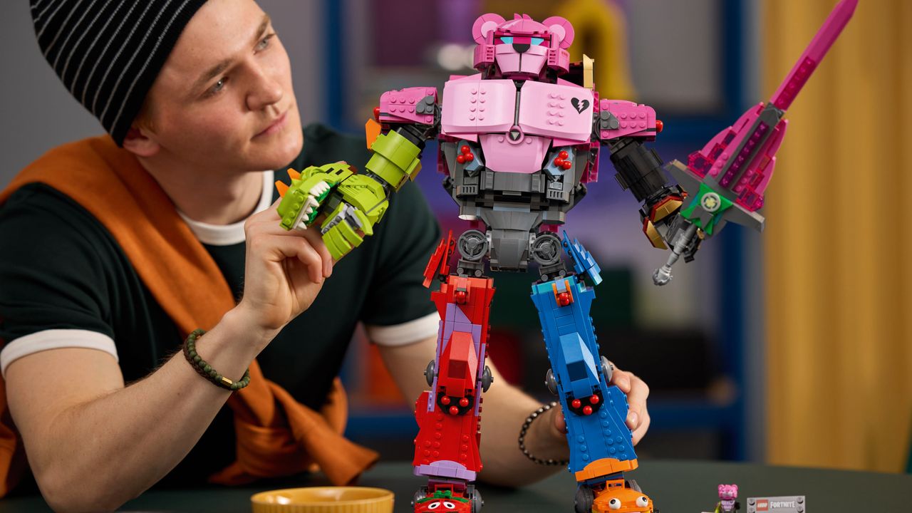 Lego Mecha Team Leader being posed by a person wearing a hat