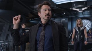 Tony Stark pointing out SHIELD agent playing Galaga