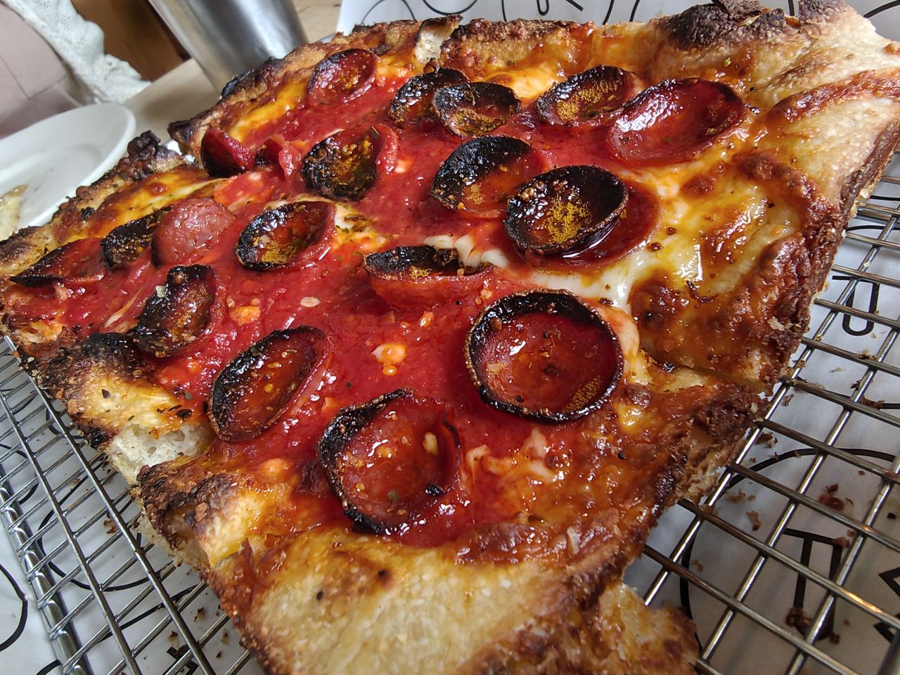Close-up photos of square pizza