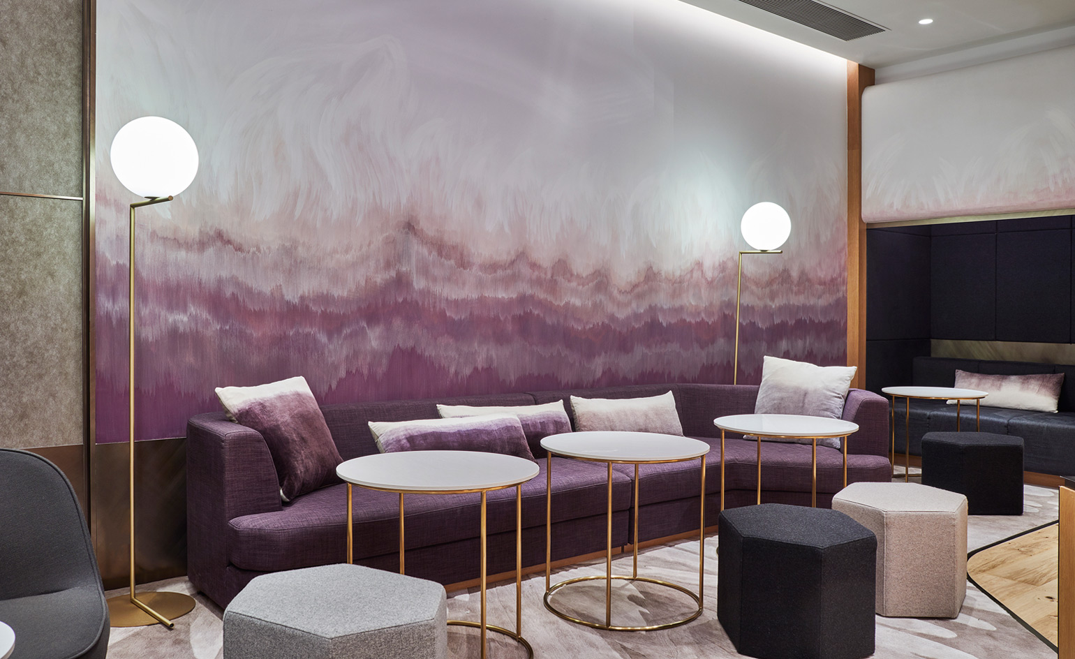 The hand-painted wall finish is by artist Elsa Jean de Dieu.