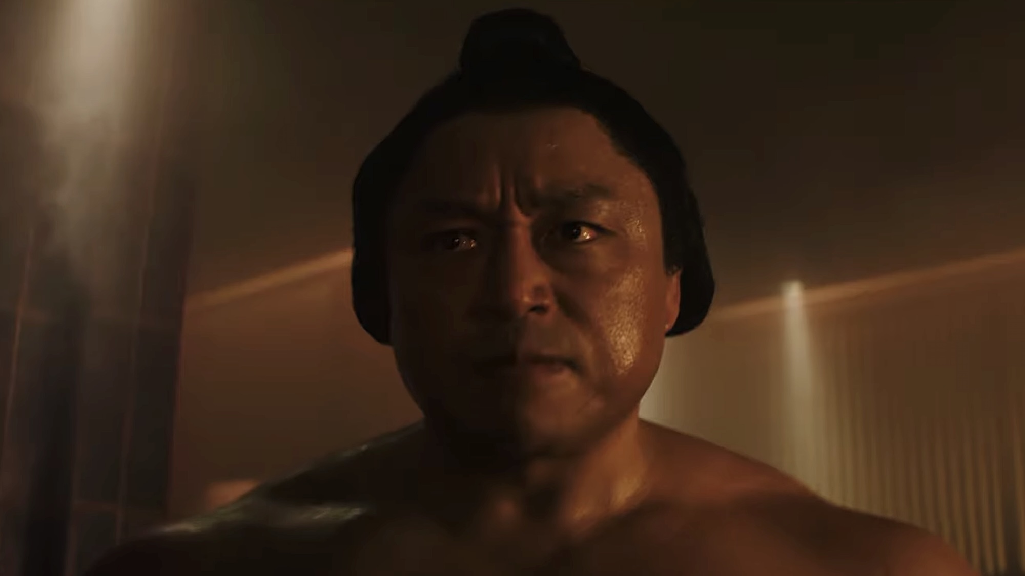 Close-up of E.Honda in steam room in Street Fighter (2026)