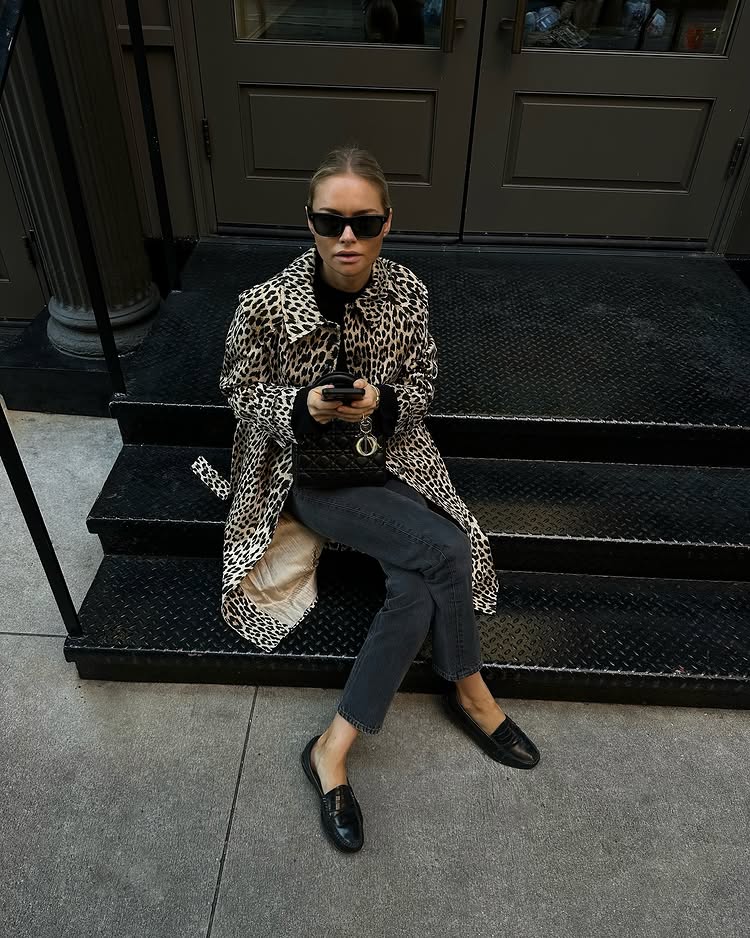 @clairerose wears a leopard print coat with faded black jeans and black leather loafers