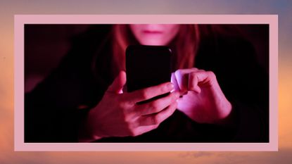 woman looking at her phone in the dark with a purple-y reflection, with a brown/pink border around the edges