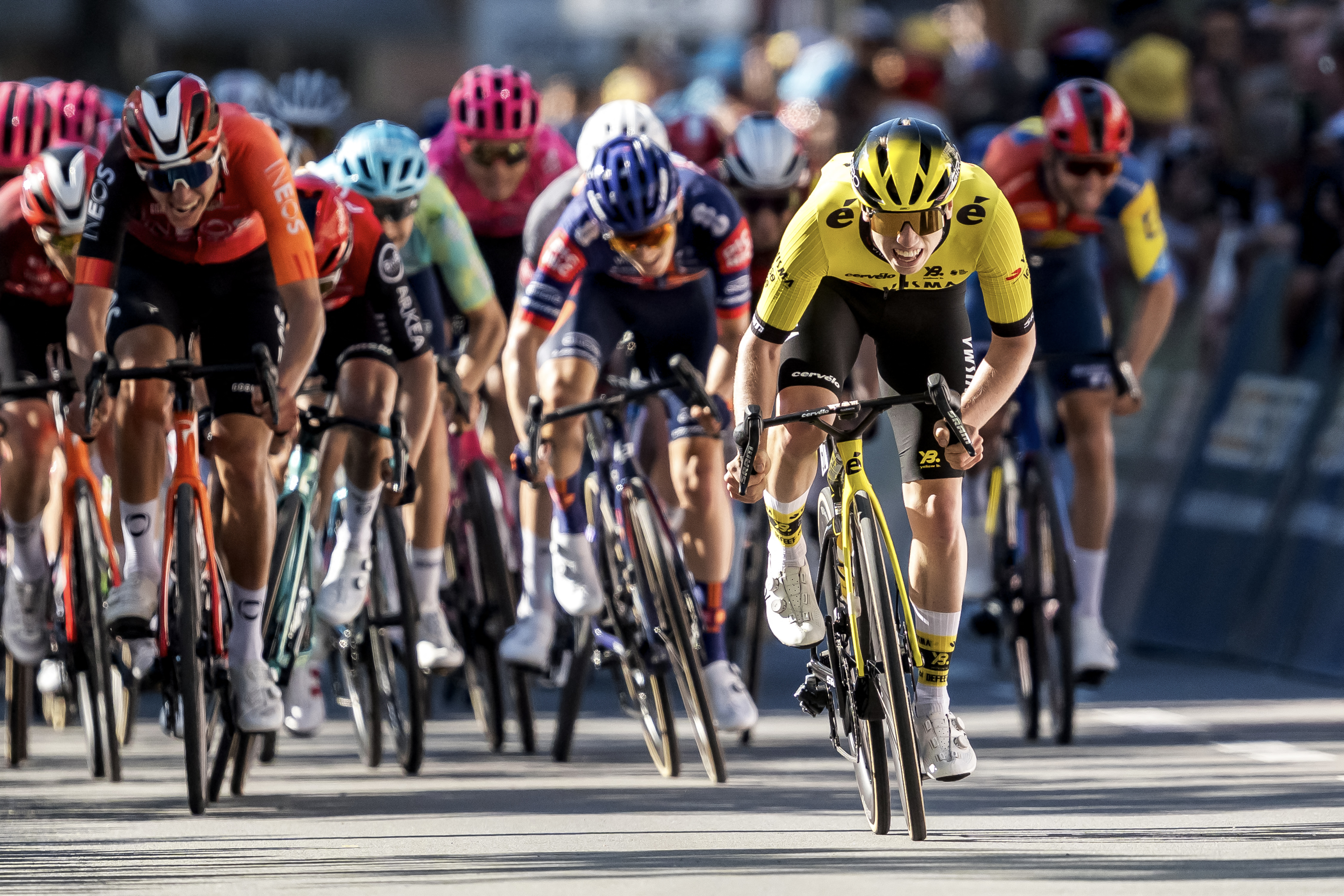 Matthew Brennan winning a stage of the Tour of Romandie 2025