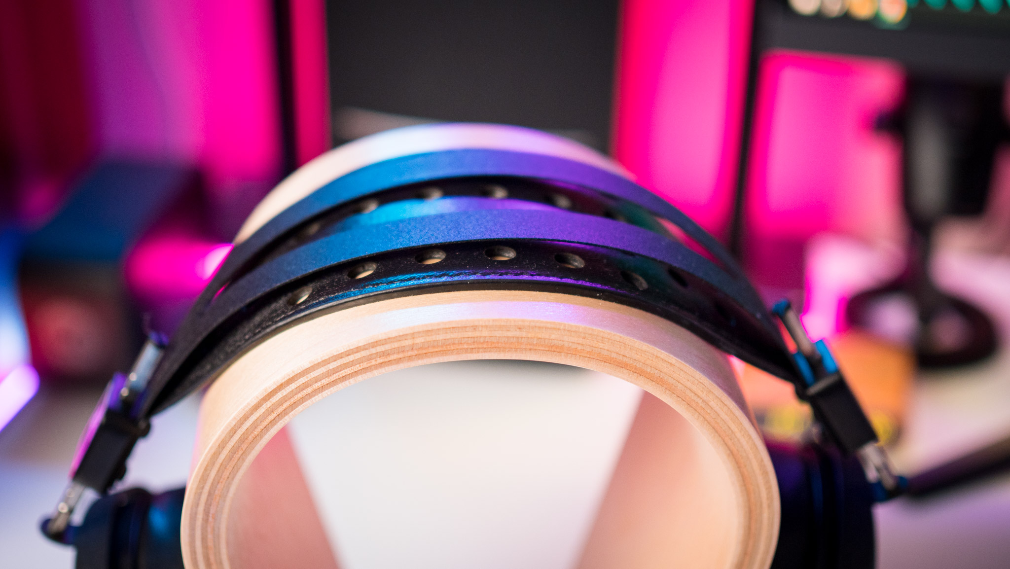 Front view of Audeze LCD-X headband against RGB lighting
