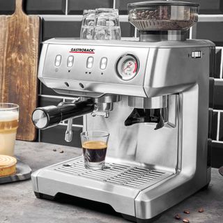 Stainless steel espresso machine on a kitchen worktop