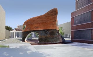 Temp’L by South Korean architectural practice Shinslab. Side view of an artistic structure made from an old ships hull with a round doorway.