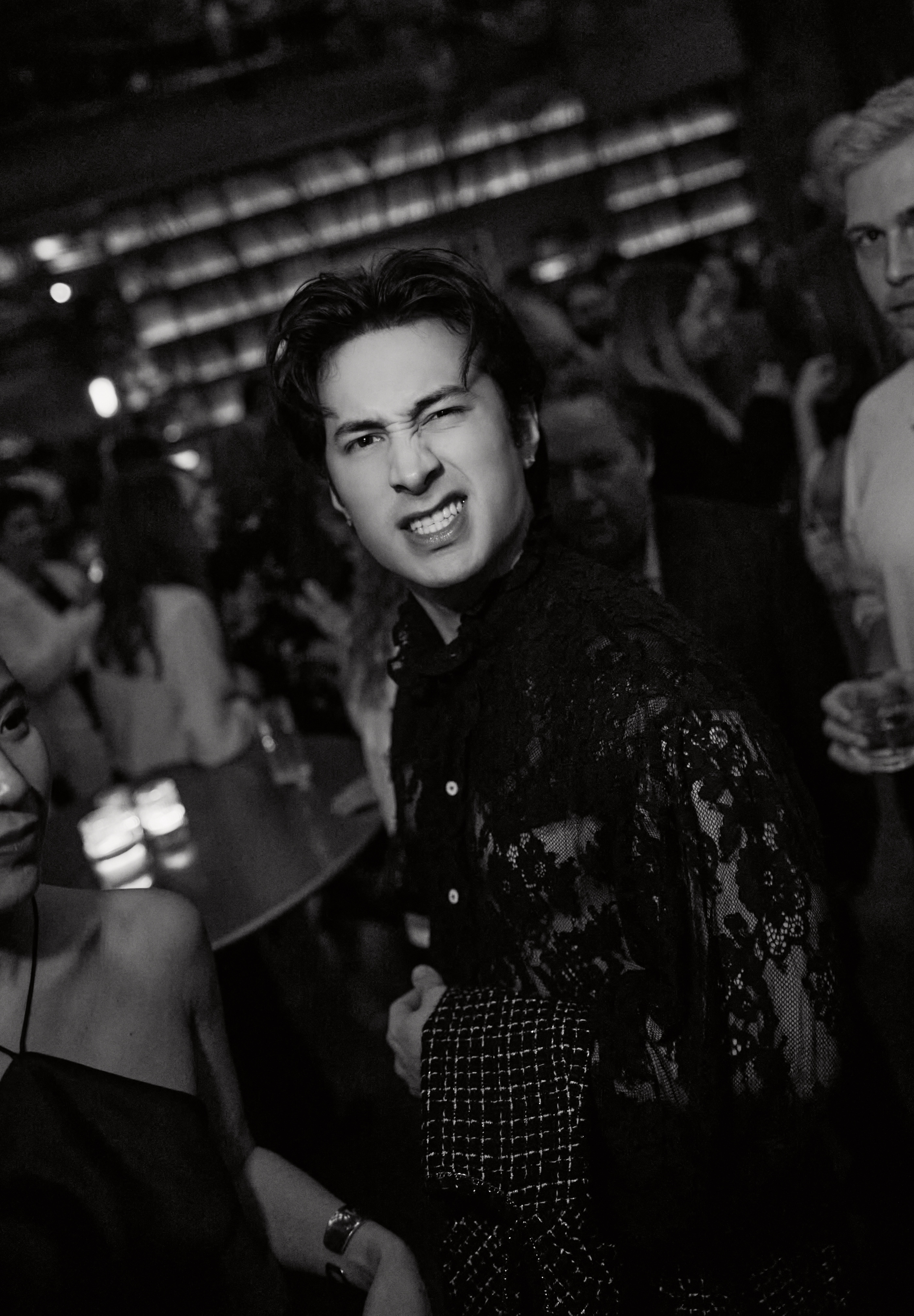 Hudson Williams wears a naked lace shirt and a tweed suit to reunite with Heated Rivalry co-star Connor Storrie at the CAA pre-Oscar party at Living Room on March 13, 2026 in Los Angeles, California