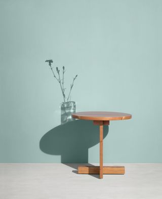 Small wooden table with round top