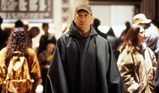 Bruce Willis as David Dunn in a train station in Unbreakable