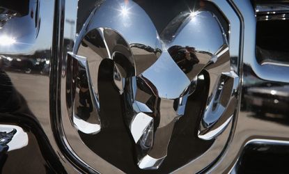 A RAM 1500 pickup truck is for sale at a Chrysler Dodge dealership on April 2.