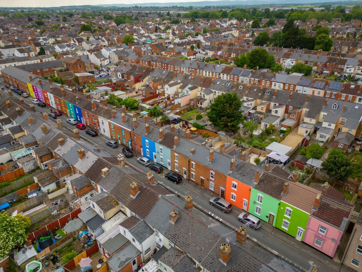 A rear shot of the brightly coloured brick houses