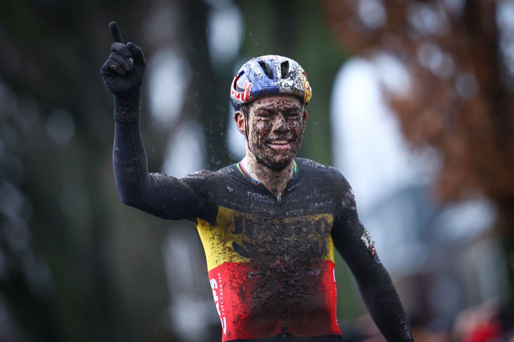 Belgian Wout Van Aert celebrates as he crosses the finish line at the end of the mens elite race of the cyclocross cycling event race 68 during the Exact Cross competition on December 30 2022 in Loenhout Belgium Belgium OUT Photo by DAVID PINTENS BELGA AFP Belgium OUT Photo by DAVID PINTENSBELGAAFP via Getty Images