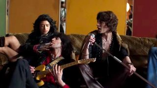 Mick Jagger, Keith Richards and Odessa A'zion in the video for In The Stars