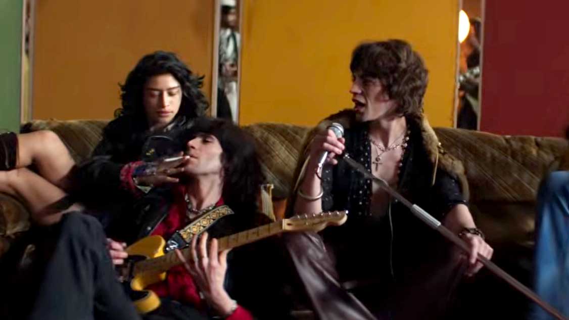 Mick Jagger, Keith Richards and Odessa A'zion in the video for In The Stars