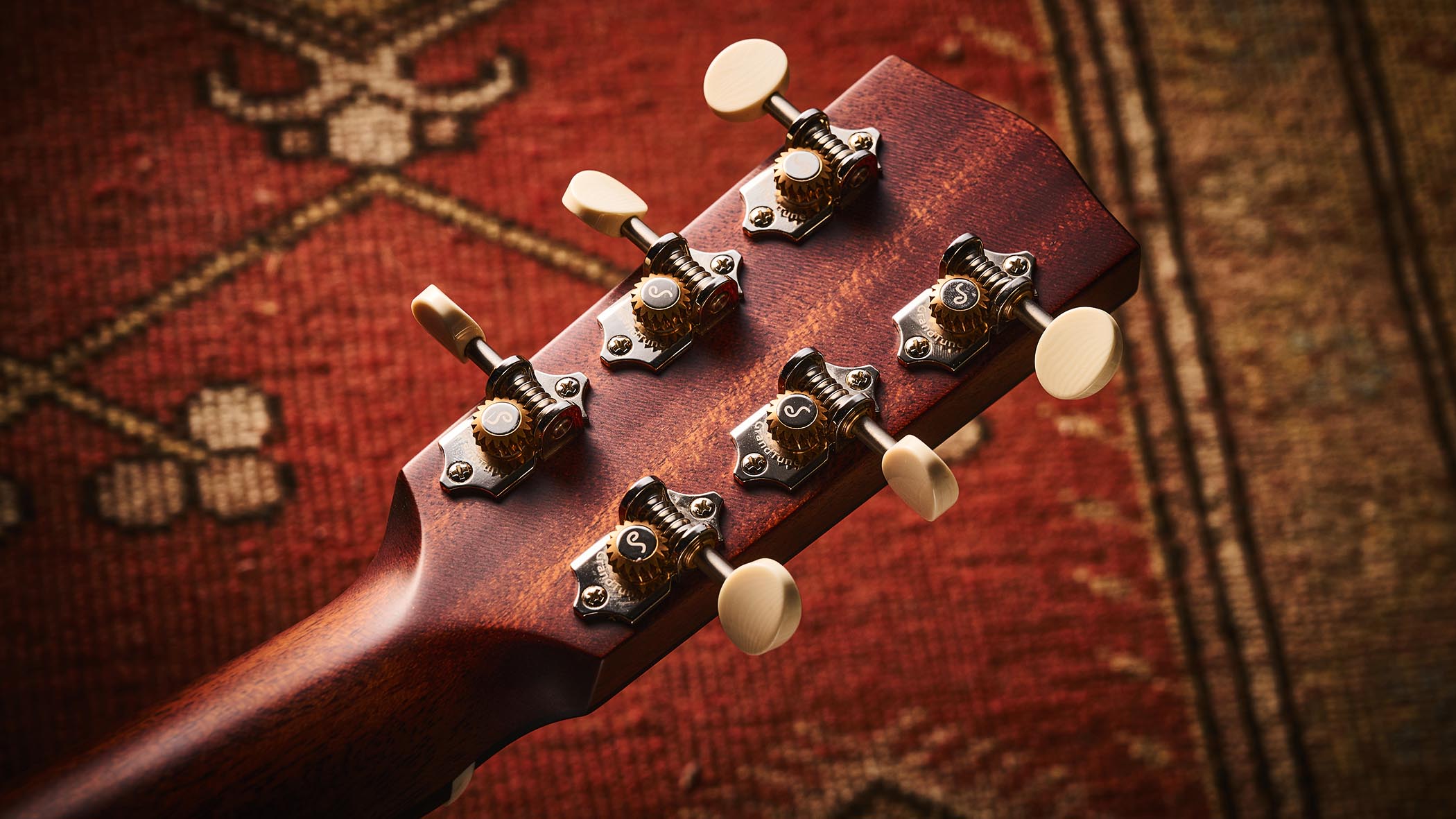 Bourgeois Slope D Standard T/S: Inspired by the J-45, this Touchstone series acoustic has. a beautiful high-gloss finish with a tiger-stripe pickguard