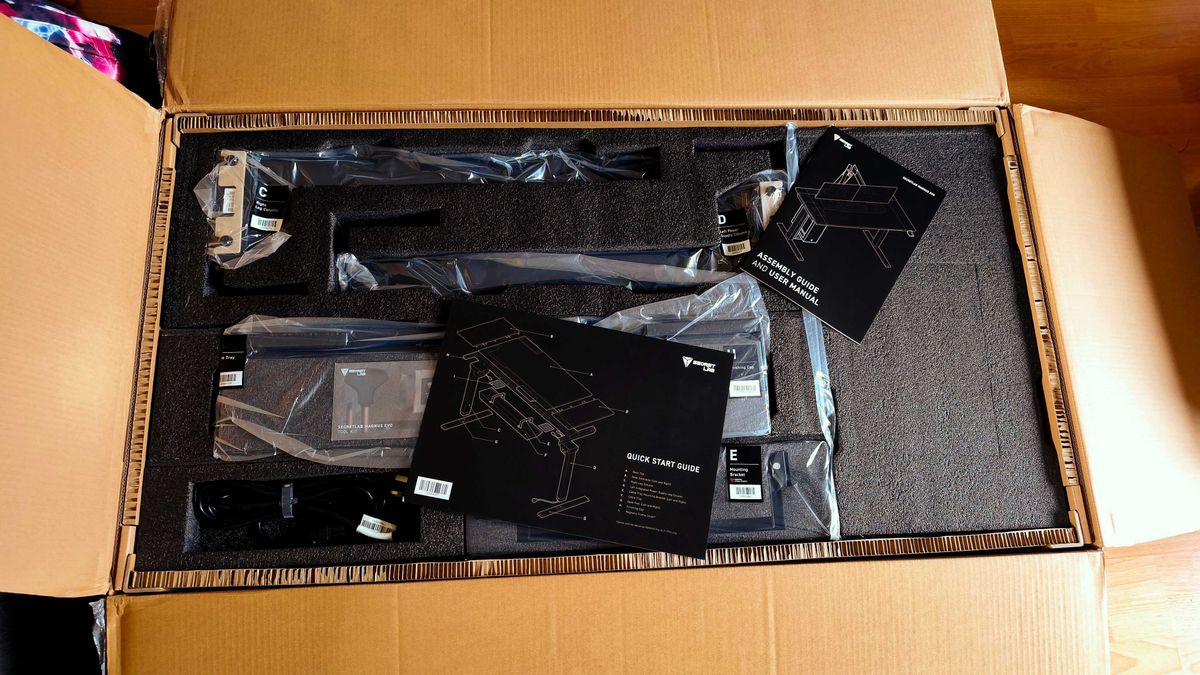 An unassembled Secretlab Magnus Evo desk in its box
