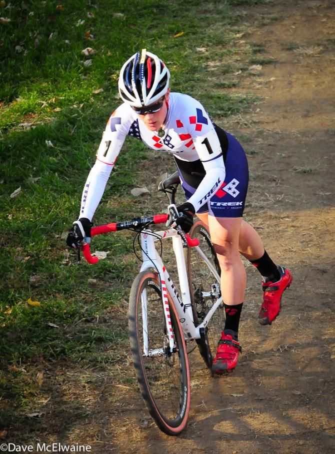 Katie Compton (Trek Cyclocross Collective) dismounting before the stone steps