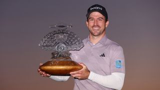 Nick Taylor holds the WM Phoenix Open trophy