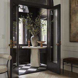 Contemplation round entryway table by Athena Calderone