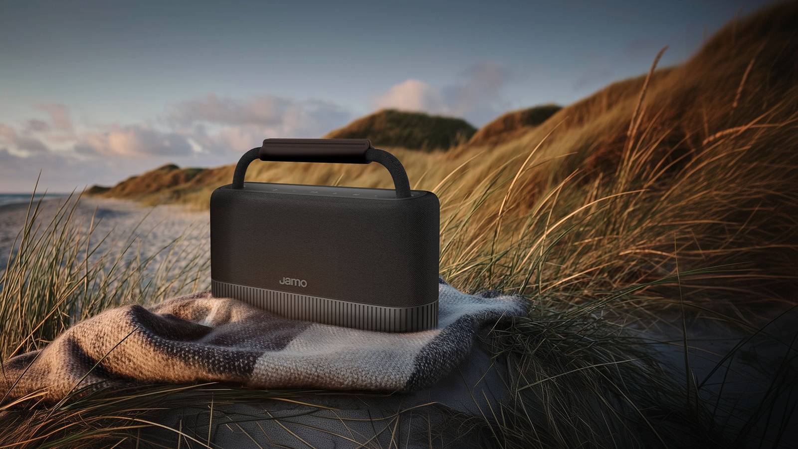 The Jamo HYG Flow on a blanket by the beach.