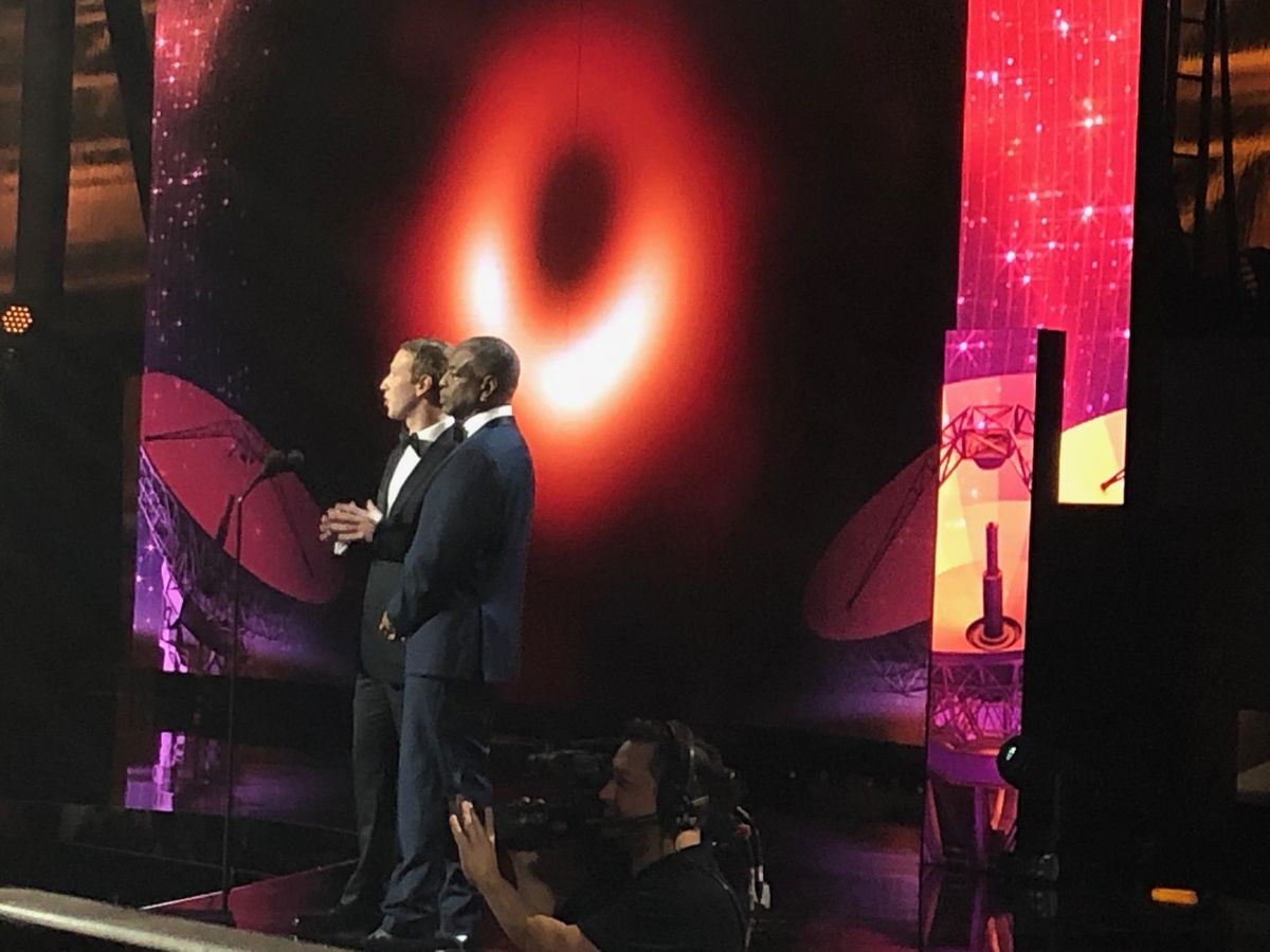 Mark Zuckerberg and LeVar Burton (right) present the $3 million annual Breakthrough Prize in Fundamental Physics to the Event Horizon Telescope team on Nov. 3, 2019, at NASA&#039;s Ames Research Center.