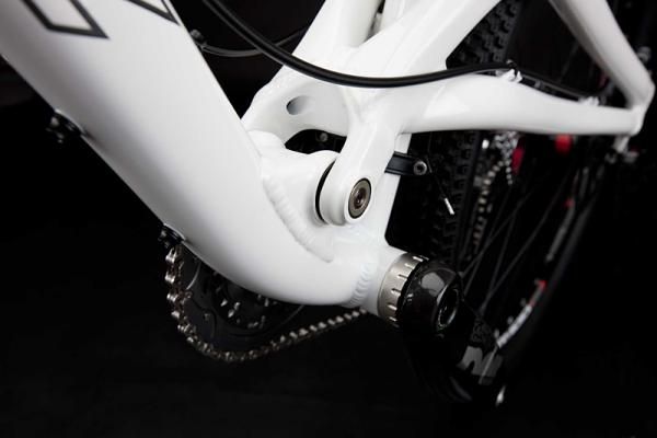 The "Actual Pivot" is located "high and forward" of the bottom bracket of the Nickel.