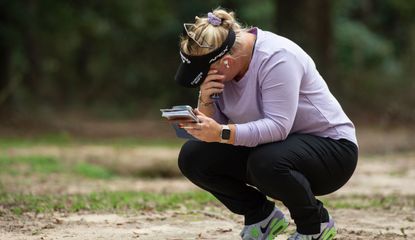 Wagner tears up while crouched down