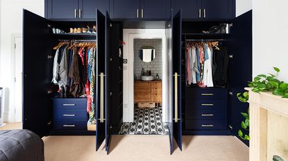 Fitted wardrobes with secret door to en suite