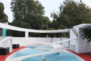 the penguin pool at the london zoo today, empty without animals or water