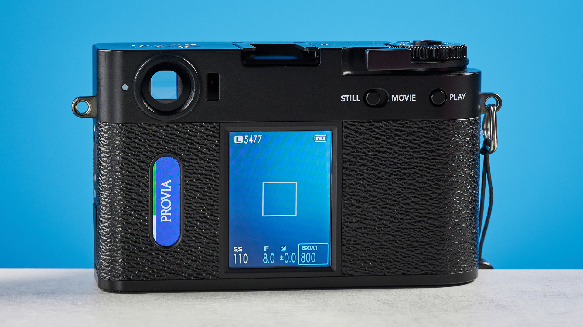 A black Fujifilm X half camera