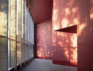 Interior design with sun light entering glass windows leaving patterns on the wall
