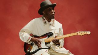 Buddy Guy plays a sunburst Fender Stratocaster