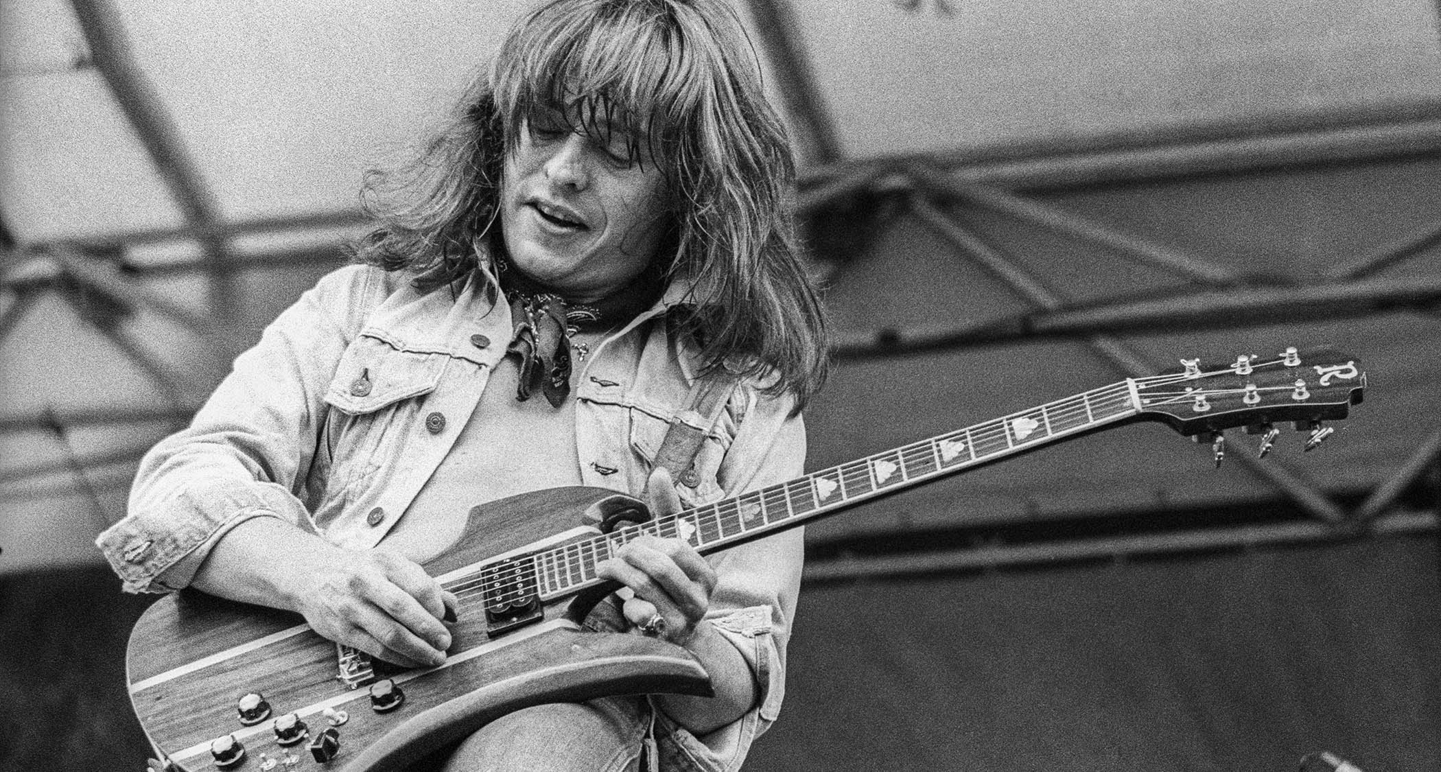Rick Derringer plays his B.C. Rich Mockingbird live onstage in an outdoor festival appearance at a Day On The Green at Oakland Stadium, 1977