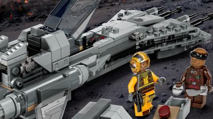 A Lego Pirate Snub Fighter is landed on a planet, with pirates in the foreground